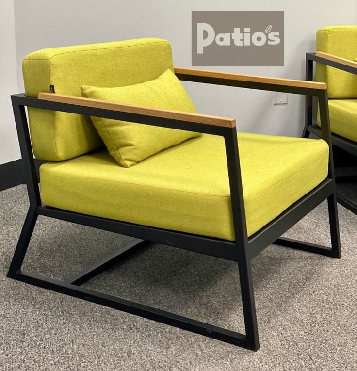 outdoor furniture set by Patios – black metal frame with wood accent and grey cushions (طقم حديقة من Patios بإطار معدني وخشب ووسائد رمادية)
