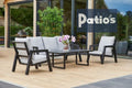 outdoor furniture set by Patios – black metal frame with wood accent and grey cushions (طقم حديقة من Patios بإطار معدني وخشب ووسائد رمادية)
